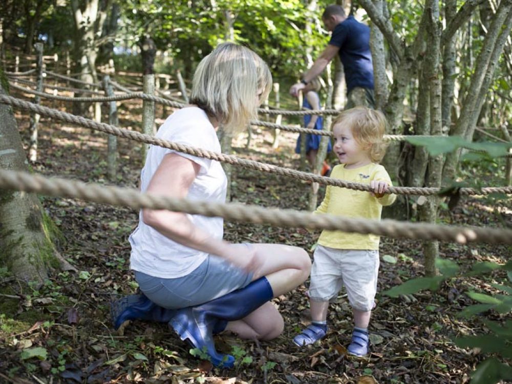 woman and young child in a rope maze at Tredethick, Cornwall