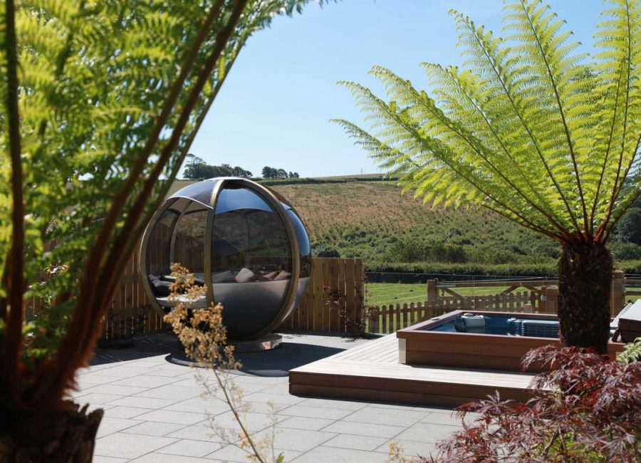 The hot tub garden at Tredethick Farm Cottages.