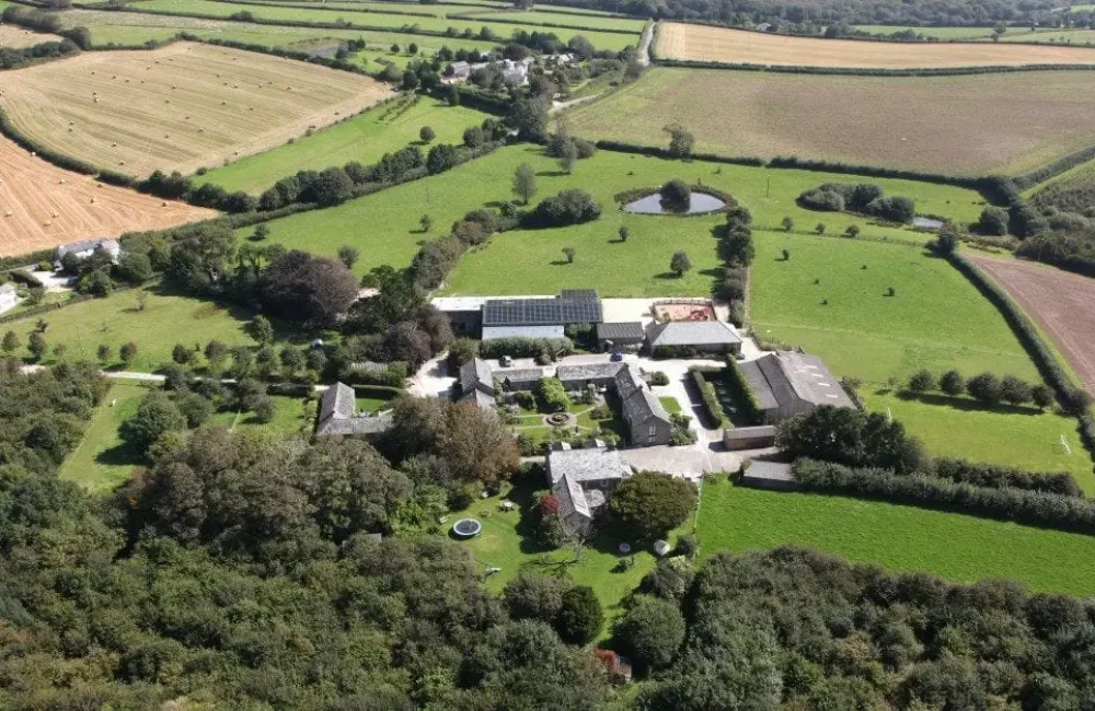 Drone image of Tredethick Farm Cottages located in Cornwall, UK