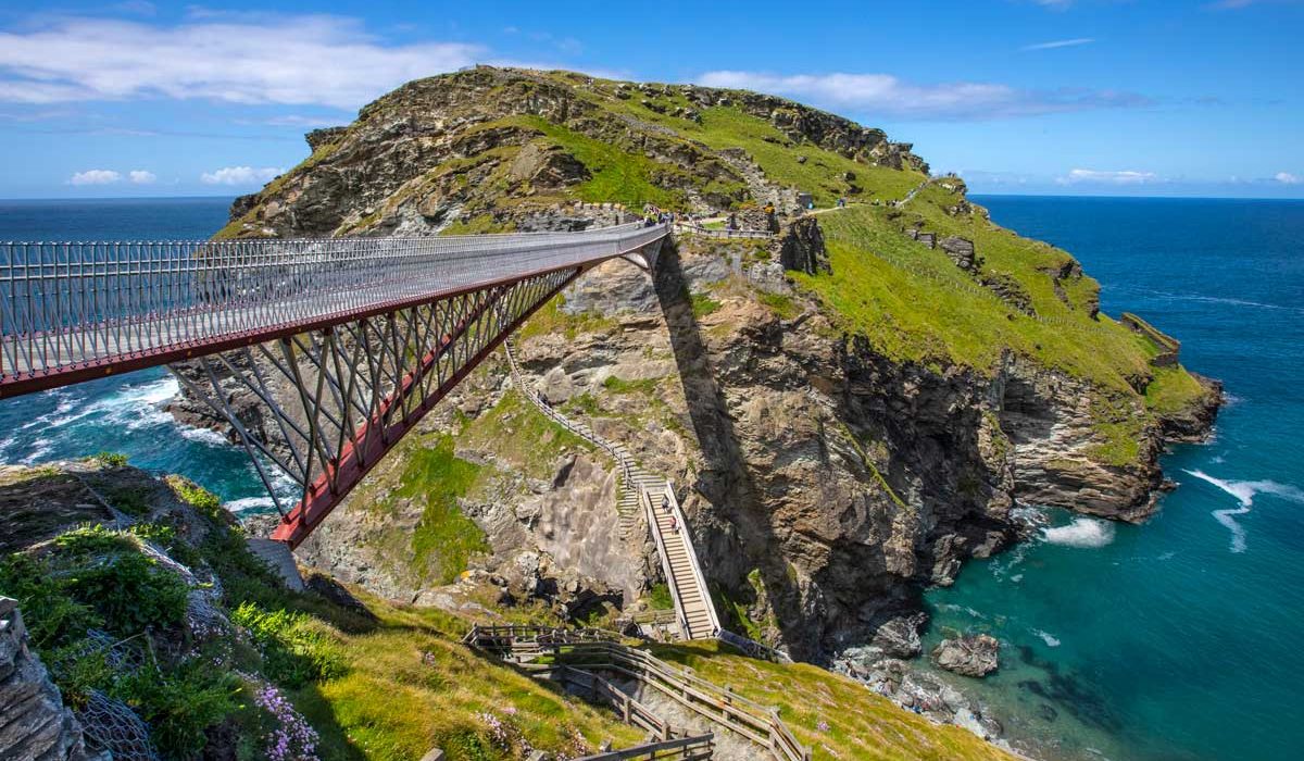 Sea view of Tintagel Castle and the footbridge to the rock